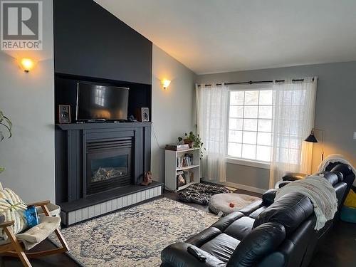 328 E Victoria Street, Vanderhoof, BC - Indoor Photo Showing Living Room With Fireplace