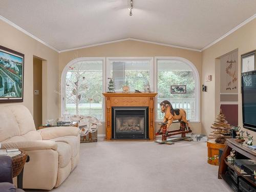 5769 River Rd, Port Alberni, BC - Indoor Photo Showing Living Room With Fireplace