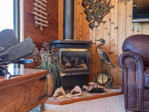 5945 Island Hwy West, Qualicum Beach, BC - Indoor With Fireplace