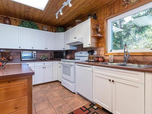 5945 Island Hwy West, Qualicum Beach, BC - Indoor Photo Showing Kitchen With Double Sink