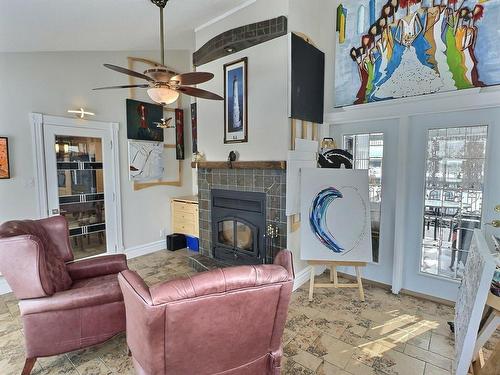 Den - 118 Rue Du Lac, Notre-Dame-Du-Nord, QC - Indoor Photo Showing Living Room With Fireplace