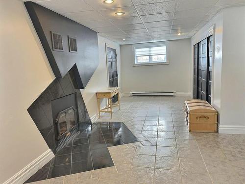 Salle familiale - 118 Rue Du Lac, Notre-Dame-Du-Nord, QC - Indoor Photo Showing Other Room
