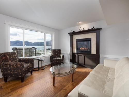 4244 Beach Avenue, Peachland, BC - Indoor Photo Showing Living Room With Fireplace