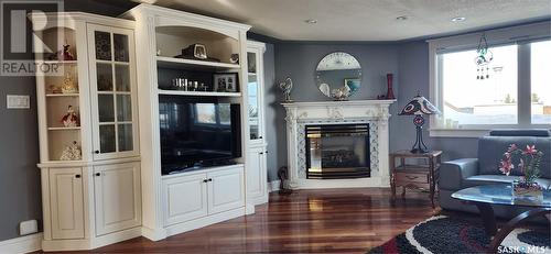 5 275 Alpine Crescent, Swift Current, SK - Indoor Photo Showing Living Room With Fireplace