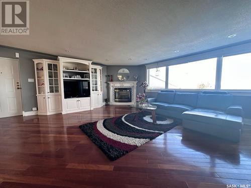 5 275 Alpine Crescent, Swift Current, SK - Indoor Photo Showing Living Room With Fireplace