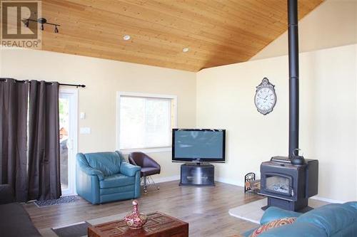 9019 S Mahood Lake Road, Canim Lake, BC - Indoor Photo Showing Living Room With Fireplace