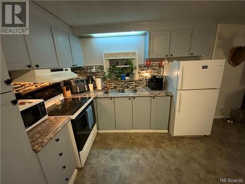 12 Chestnut Street, Woodstock, NB - Indoor Photo Showing Kitchen With Double Sink