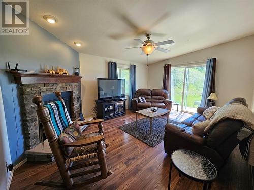 7882 Highway 29S Highway, Chetwynd, BC - Indoor Photo Showing Living Room With Fireplace