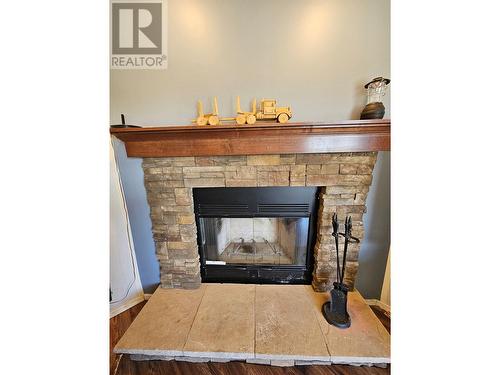 7882 Highway 29S Highway, Chetwynd, BC - Indoor Photo Showing Living Room With Fireplace