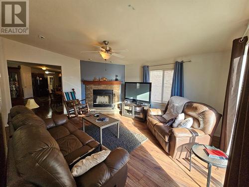 7882 Highway 29S Highway, Chetwynd, BC - Indoor Photo Showing Living Room With Fireplace