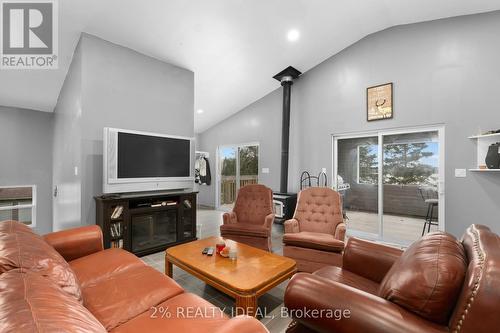 11 Nickles Cove Rd, Whitestone, ON - Indoor Photo Showing Living Room With Fireplace