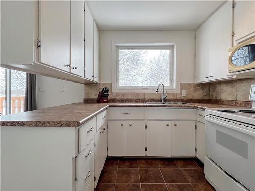 301 5Th Avenue, Rivers, MB - Indoor Photo Showing Kitchen With Double Sink