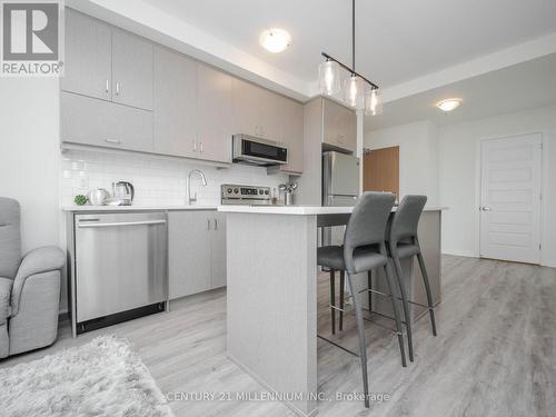 #430 -1105 Leger Way, Milton, ON - Indoor Photo Showing Kitchen With Upgraded Kitchen