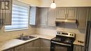 7421 Leesburg Street, Mississauga, ON  - Indoor Photo Showing Kitchen With Double Sink 