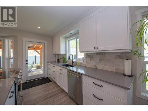 2200 Linea Crescent, Lumby, BC - Indoor Photo Showing Kitchen With Double Sink