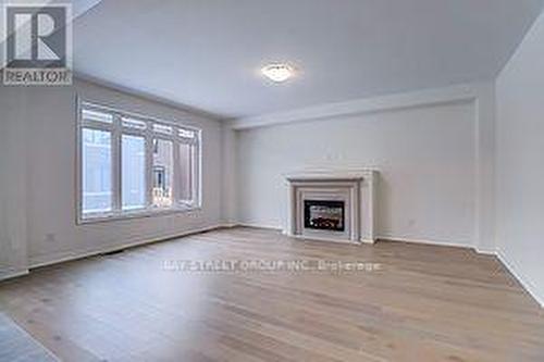 309 Boundary Blvd S, Whitchurch-Stouffville, ON - Indoor Photo Showing Other Room With Fireplace