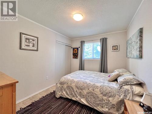 220 Sovereign Crescent, Coteau Beach, SK - Indoor Photo Showing Bedroom