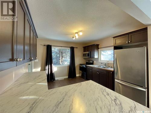 224 2Nd Avenue S, Yorkton, SK - Indoor Photo Showing Kitchen With Double Sink