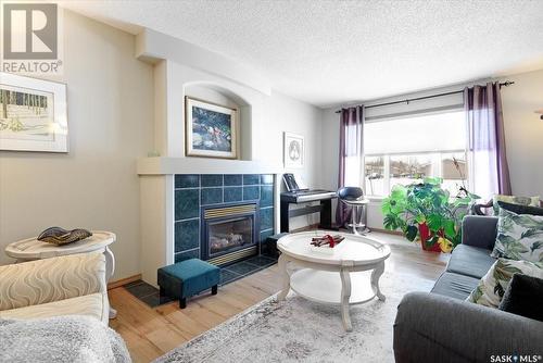 302 Okanese Avenue N, Fort Qu'Appelle, SK - Indoor Photo Showing Living Room With Fireplace