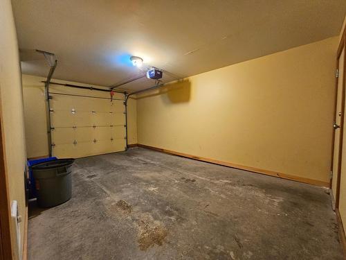 103 - 41 Rivermount Place, Fernie, BC - Indoor Photo Showing Garage