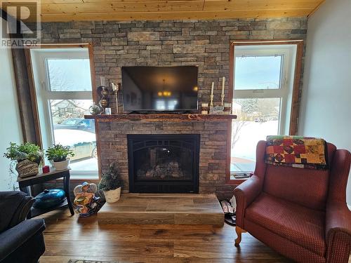 56 Sukunka Place, Tumbler Ridge, BC - Indoor Photo Showing Living Room With Fireplace