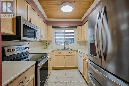 9 - 24 Laguna Parkway, Ramara, ON - Indoor Photo Showing Kitchen With Double Sink