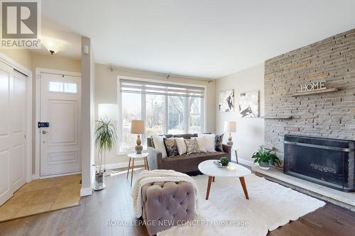 24 Fleetwell Crt, Toronto, ON - Indoor Photo Showing Living Room With Fireplace