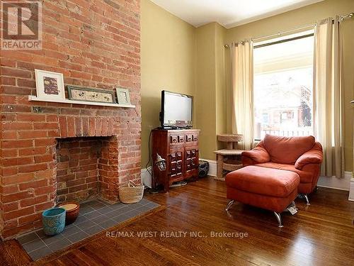 299 Pacific Ave, Toronto, ON - Indoor Photo Showing Living Room With Fireplace