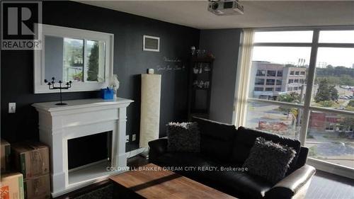 507 - 235 Sherway Gardens Road, Toronto, ON - Indoor Photo Showing Living Room With Fireplace