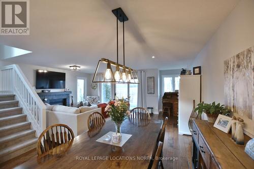 568 Oxbow Cres, Collingwood, ON - Indoor Photo Showing Dining Room With Fireplace