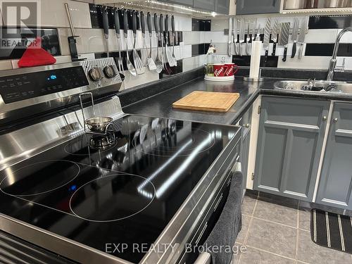 90 - 3040 Constitution Boulevard, Mississauga, ON - Indoor Photo Showing Kitchen With Double Sink