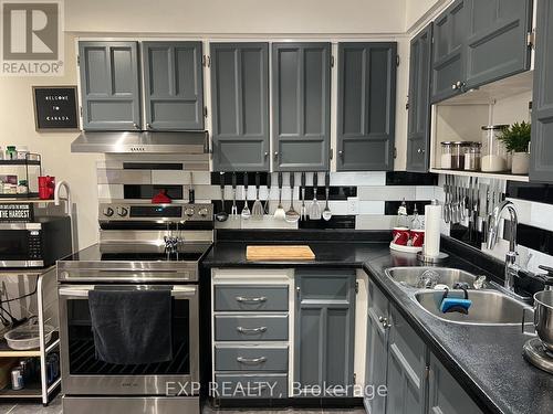 #90 -3040 Constitution Blvd, Mississauga, ON - Indoor Photo Showing Kitchen With Double Sink