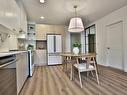 Salle Ã  manger - 224-2000 Rue Benoit, Saint-Bruno-De-Montarville, QC  - Indoor Photo Showing Kitchen With Upgraded Kitchen 