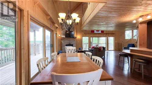 10 Miller Lake Shore Road, Northern Bruce Peninsula, ON - Indoor Photo Showing Dining Room With Fireplace