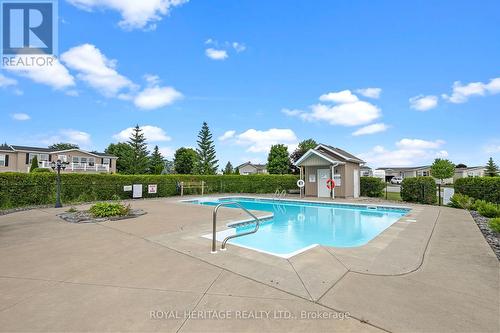 53 Creekside Circ, Kawartha Lakes, ON - Outdoor With In Ground Pool