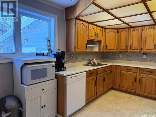 204 3Rd Avenue Sw, Leroy, SK - Indoor Photo Showing Kitchen With Double Sink