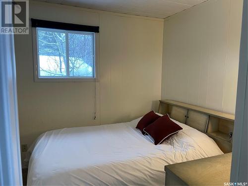 27 Oskunamoo Drive, Greenwater Provincial Park, SK - Indoor Photo Showing Bedroom