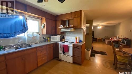 107 Main Street, Lanigan, SK - Indoor Photo Showing Kitchen With Double Sink