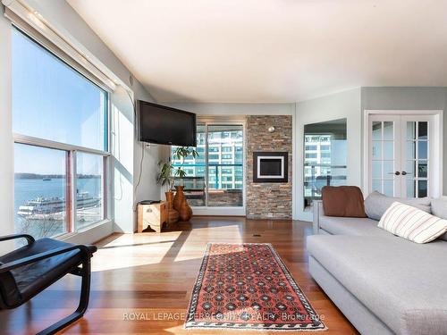 708-S/T-99 Harbour Sq, Toronto, ON - Indoor Photo Showing Living Room With Fireplace