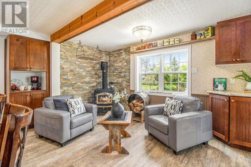 Cozy gathering space with wood stove - 342 Mountainview Road, Arnprior, ON - Indoor Photo Showing Living Room