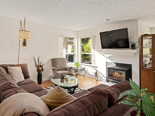 3468 Arbutus Dr South, Cobble Hill, BC - Indoor Photo Showing Living Room With Fireplace
