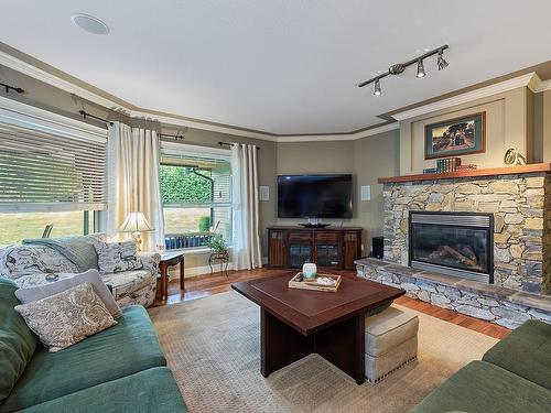 990 Matuka Dr, Nanoose Bay, BC - Indoor Photo Showing Living Room With Fireplace