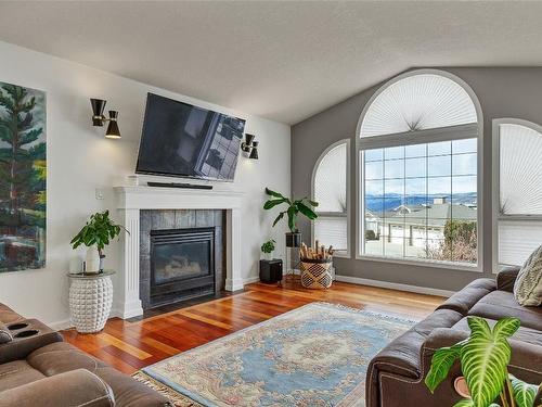 4509 Wellington Drive, Vernon, BC - Indoor Photo Showing Living Room With Fireplace