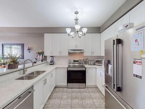 23 Bakewell St, Brampton, ON - Indoor Photo Showing Kitchen With Double Sink