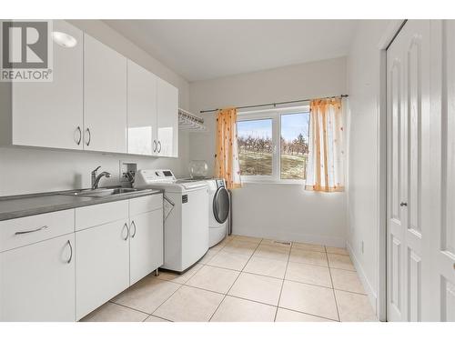 14225 Oyama Road, Lake Country, BC - Indoor Photo Showing Laundry Room