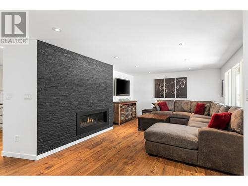 3155 Mathews Road, Kelowna, BC - Indoor Photo Showing Living Room With Fireplace