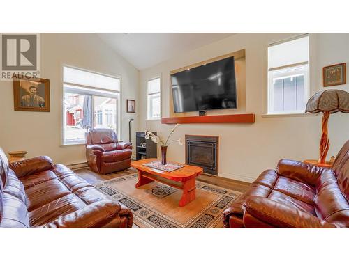 2450 Radio Tower Road Unit# 007, Oliver, BC - Indoor Photo Showing Living Room With Fireplace