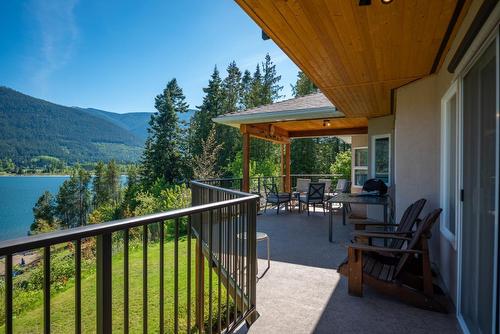 6360 Sunshine Drive, Nelson, BC - Outdoor With Body Of Water With Deck Patio Veranda With Exterior