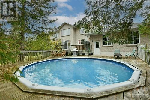 119 Scotch Pine Grove, Dunrobin, ON - Outdoor With Above Ground Pool