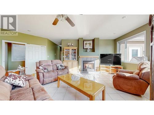 11700 Quail Ridge Place, Osoyoos, BC - Indoor Photo Showing Living Room With Fireplace